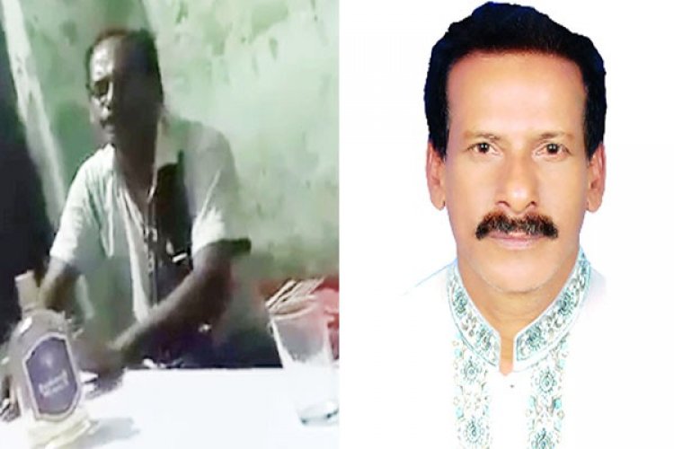 মদের বোতল নিয়ে গান গাইছেন নৌকার প্রার্থী