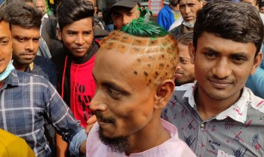 আনারসের আদলে চুল কেটে নির্বাচনী প্রচারণায় সমর্থক