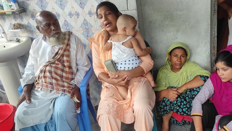 মেয়েকে বুকে জড়িয়ে স্বামীর মরদেহের অপেক্ষায় বিজিবি মাহবুবের স্ত্রী