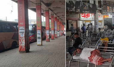 যাত্রী নেই, ঘুমিয়ে-গল্প করে সময় পার করছেন বাসের স্টাফরা