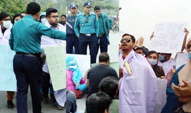 পিএসসির সামনে কাফনের কাপড় পরে চাকরিপ্রার্থীরা